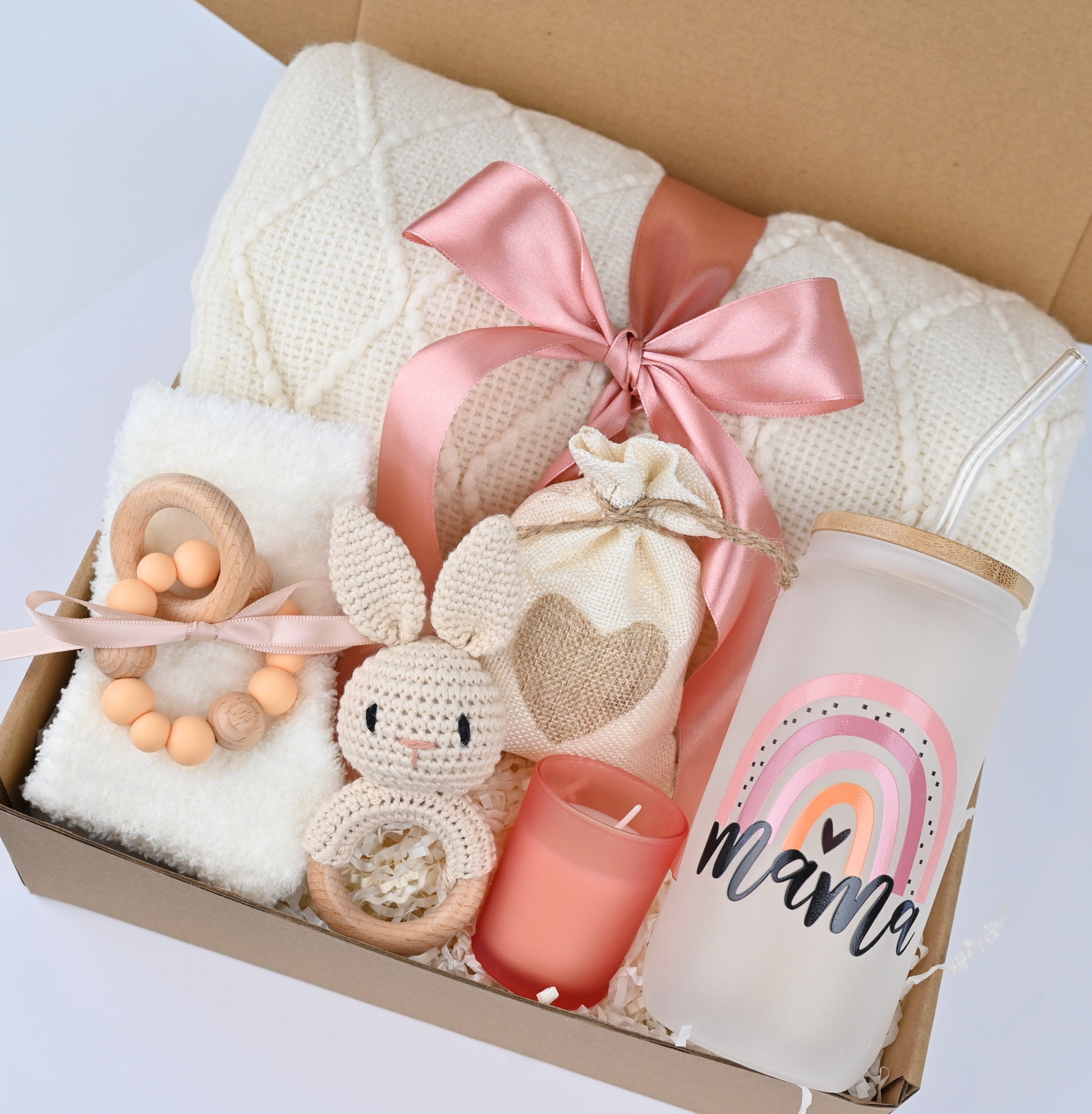 What's included:

Wool Blanket 50x60 inch

Super soft Socks

16 oz Glass MAMA with straw

Wooden rattle

Teaser for teeth made of natural rubber and wood

Wooden rattle

Aroma candle